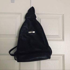 Crossbody/2 strapped backpack